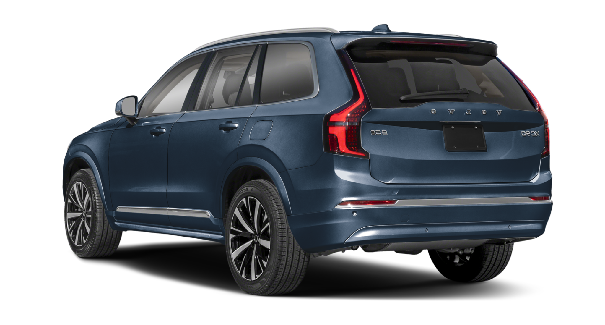 Rear exterior of the 2025 Volvo XC90 AWD Core with LED taillights, bold VOLVO badging, and B5 AWD badge highlighting its hybrid powertrain.