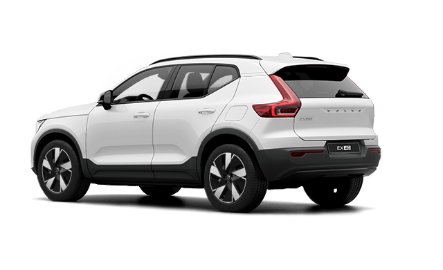rear profile of the 2025 Volvo EX40 AWD Core highlighting the minimalist body lines, black roof contrast, and alloy wheels.