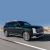 2026 Hyundai Palisade driving on road, highlighting hybrid SUV performance