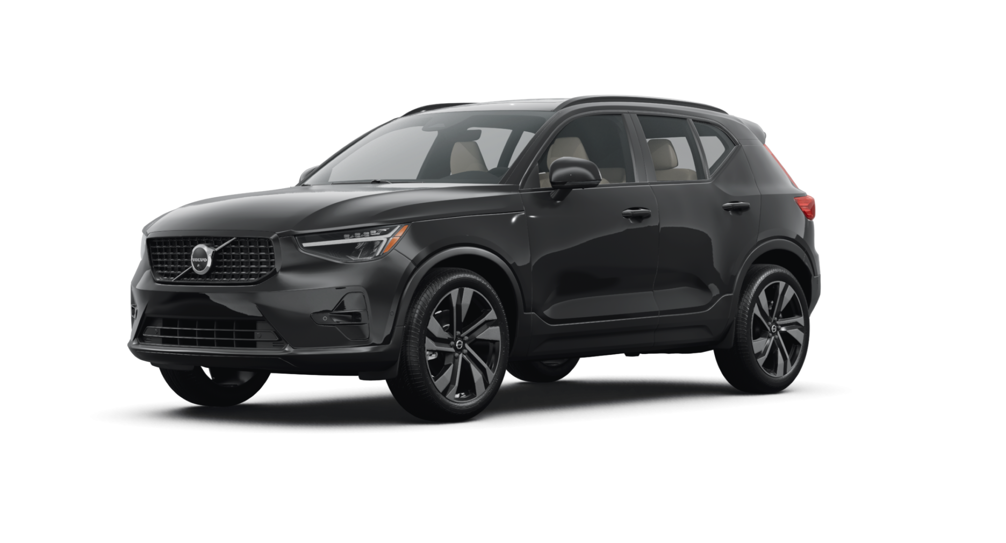 2025 Volvo XC40 AWD Core front view with signature Thor’s Hammer LED headlights, bold front grille, and Scandinavian-inspired luxury SUV design.