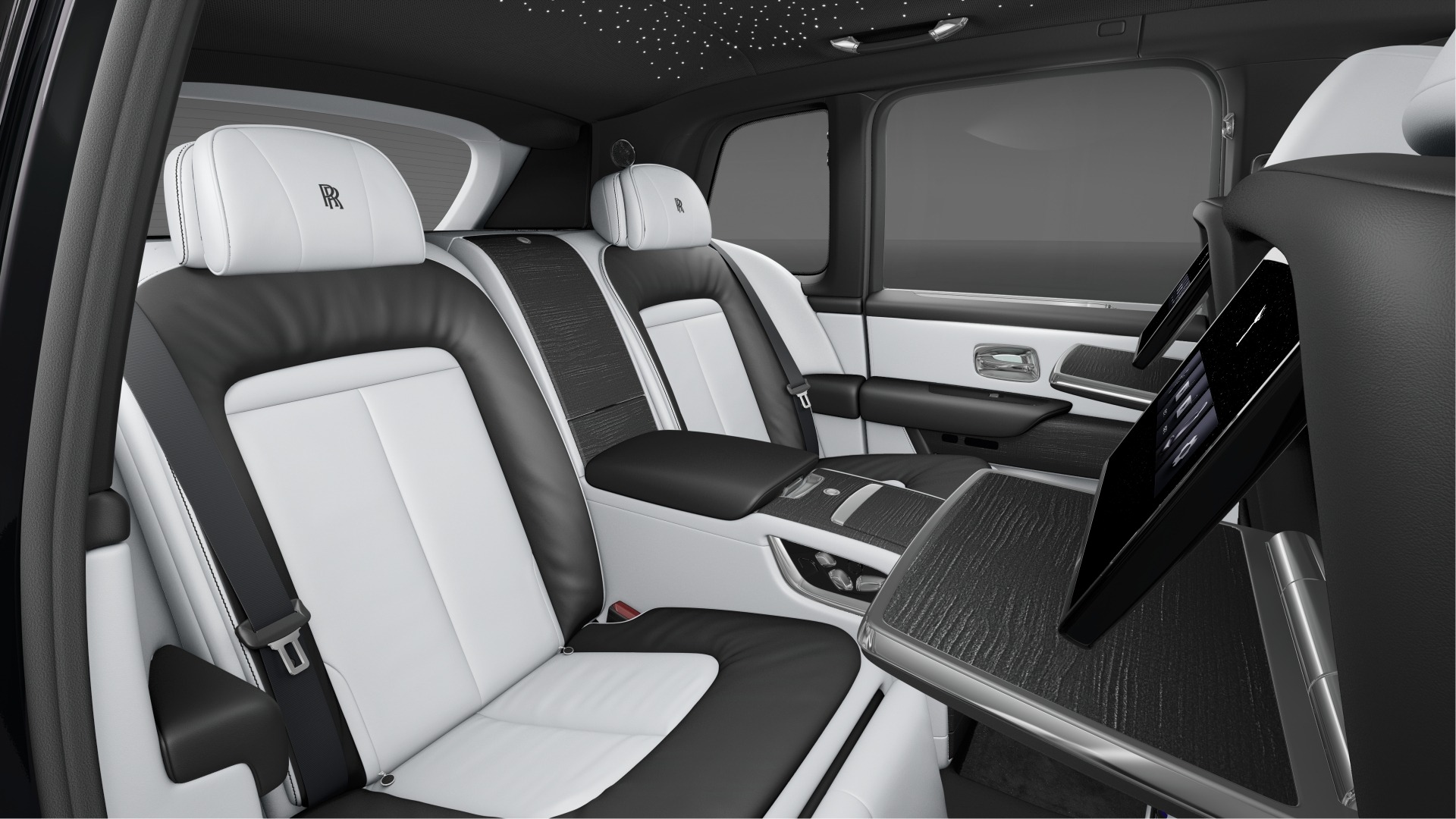 Rear seats of Rolls Royce Cullinan showing leather luxury and comfort