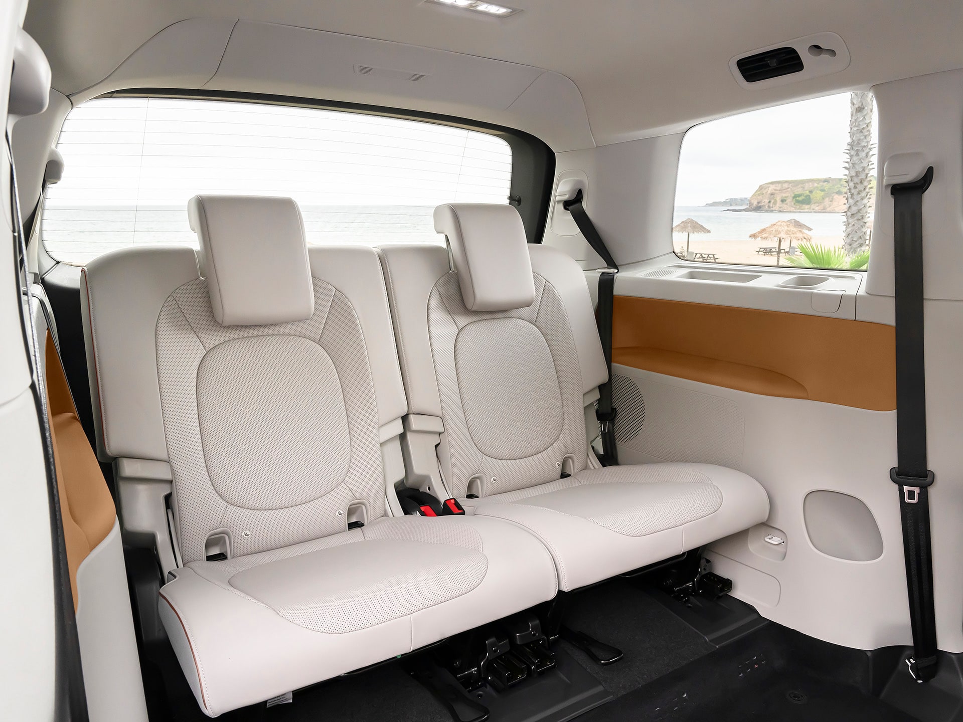 Cabin view of 2025 VOLKSWAGEN ID BUZZ LEASE with seating layout and ambient lighting